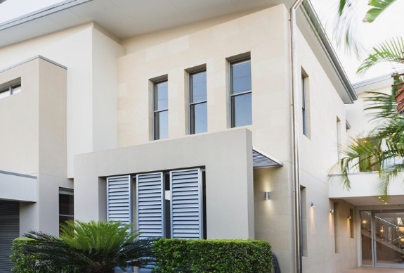 Modern two-story home with tall windows