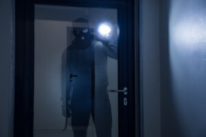 Burglar looking through Security Window Films